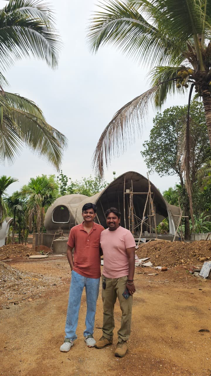 A dome cottage shell under construction at AKAYA Resort, Gokarna, with bamboo scaffolding and the PBJ team on site