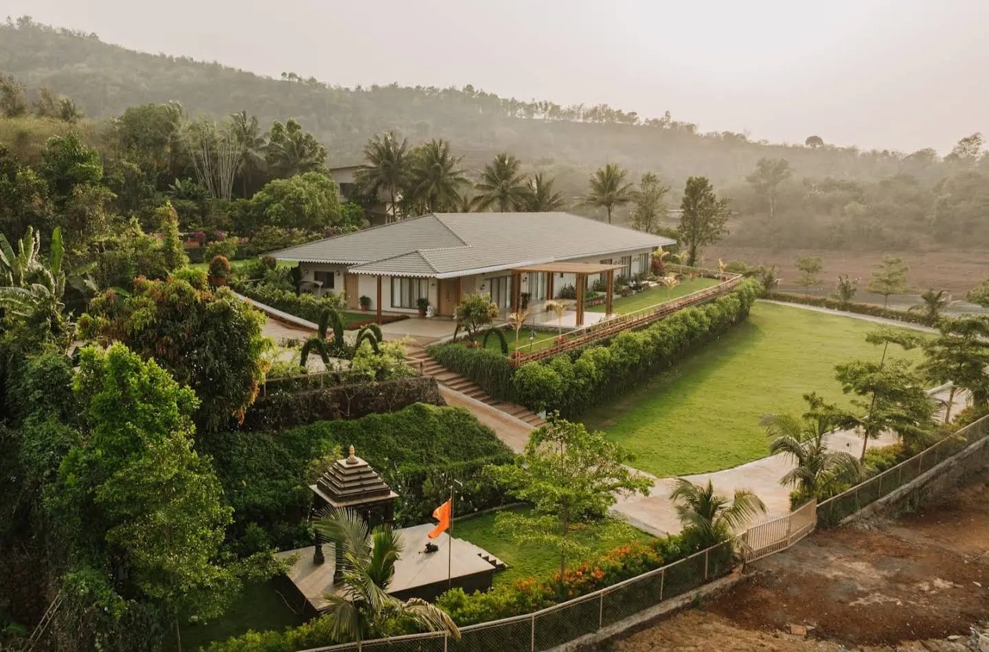 The main hall and terraced gardens at Jalashay Resort, Panshet, built by PBJ Infra