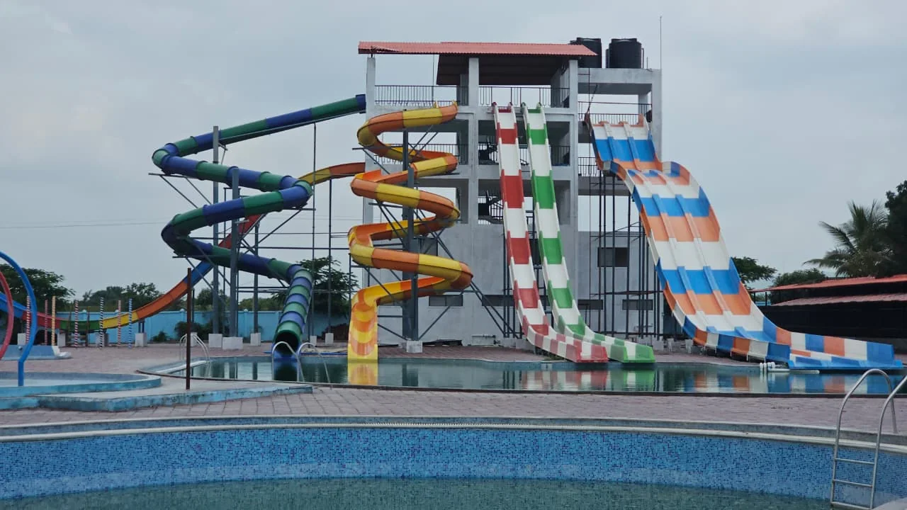 The multi-lane slide tower — helix, spiral and side-by-side racer slides — rising from the launch platform